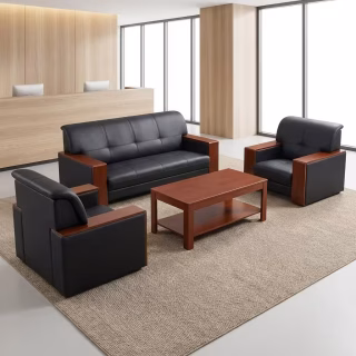 Corporate 5-seater office lounge sofa set featuring one three-seater couch and two single armchairs in black tufted leather with thick cherry wood armrests, arranged around a matching dual-tier wood coffee table.