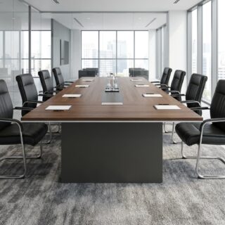 A long rectangular walnut wood Modern Executive Conference Table featuring integrated central multimedia power tracks and large dark grey box-column structural bases.