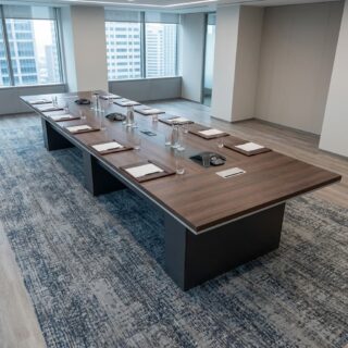 Shop the flagship Executive Boardroom Conference Table. Features a rich walnut finish, integrated multimedia power channels, and large seating capacity.