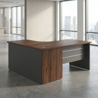 An L-shaped executive office desk featuring a rich walnut wood-grain desktop surface, integrated cable management grommet, dark charcoal gray side panels, and horizontal silver metallic accents.